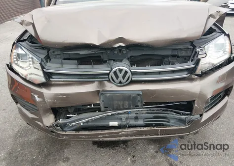 2014 Volkswagen Touareg 3.6L Executive z USA, uszkodzony, nr VIN WVGEF9BP7ED005811